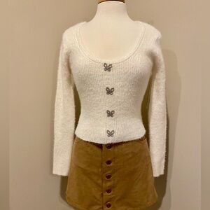 Chic White Sweater with Butterfly Accents